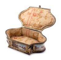 A Sèvres Style Painted and Parcel Gilt Porcelain Table Casket