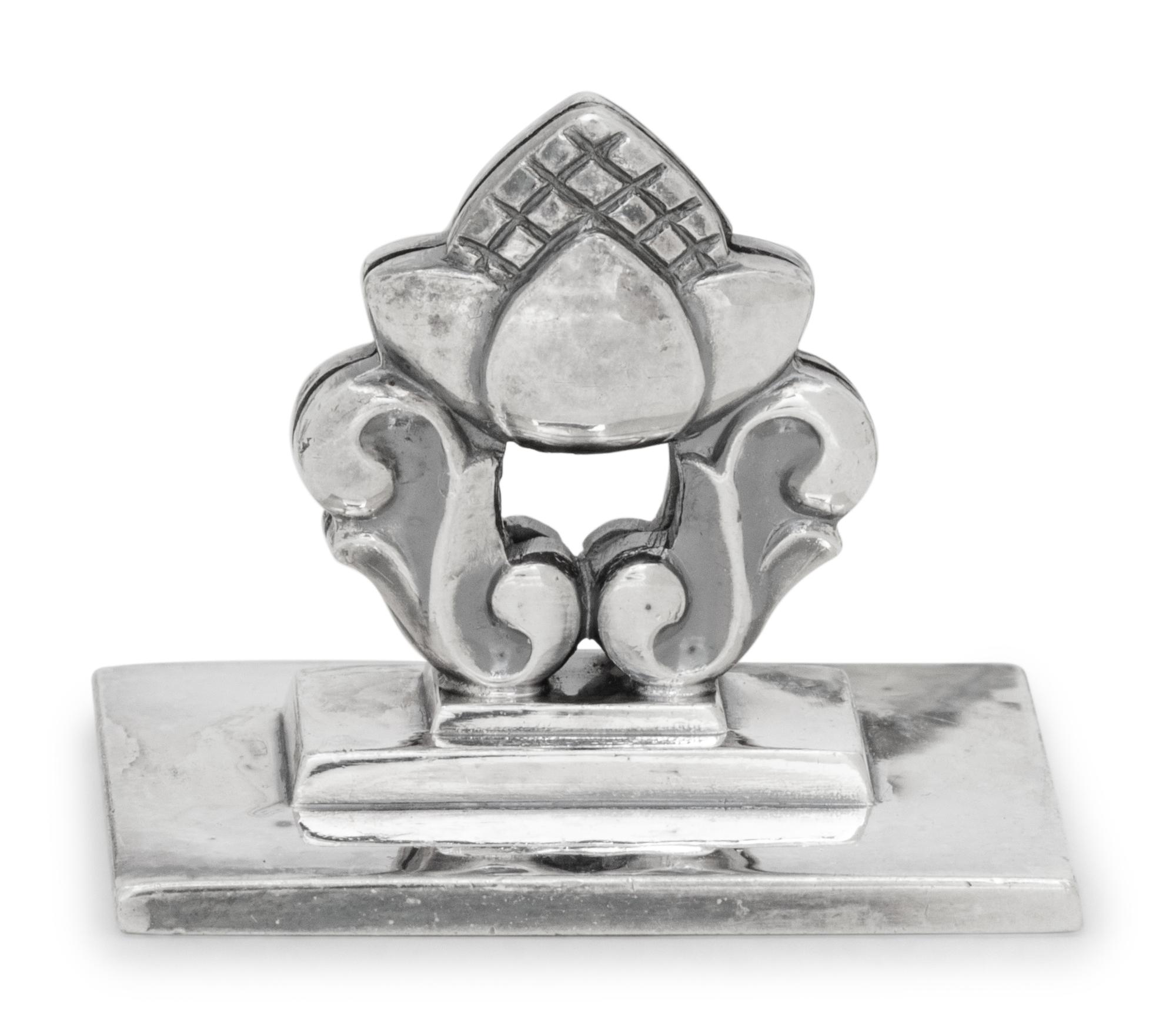 A Set of Twelve Georg Jensen Silver Acorn Place Card Holders