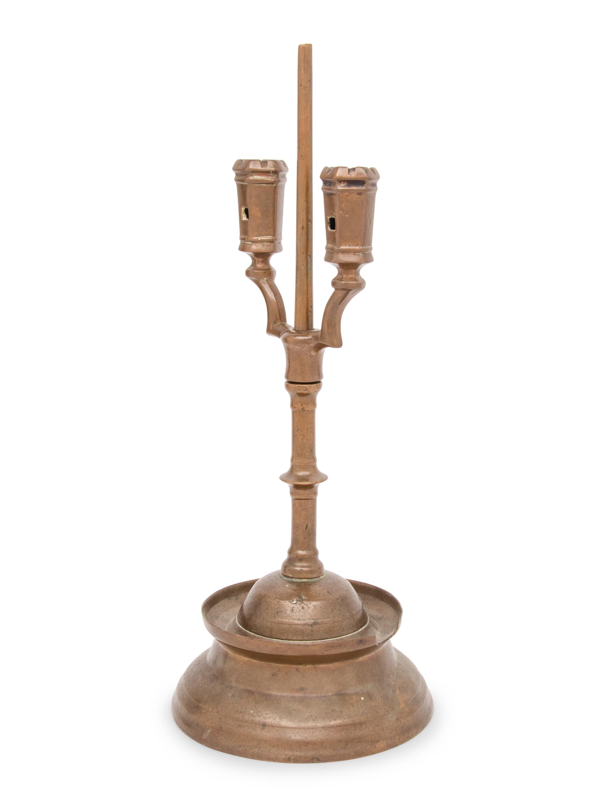 A Southern German Three Kings Two-Light Candlestick