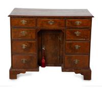 A George II Style Burl Walnut Kneehole Desk — 19TH CENTURY