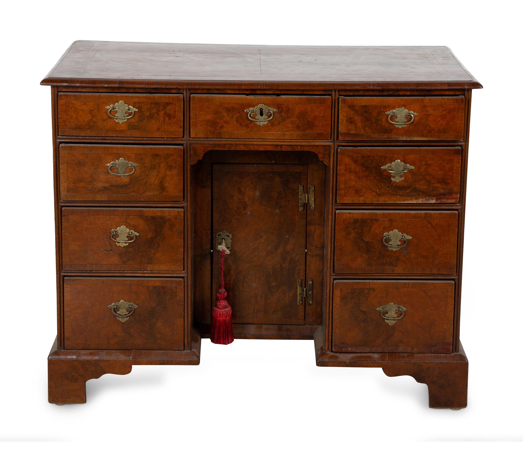 A George II Style Burl Walnut Kneehole Desk — 19TH CENTURY