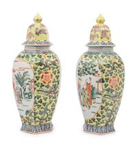 A Pair of Chinese Yellow Ground Famille Rose Hexagonal Vases and Covers