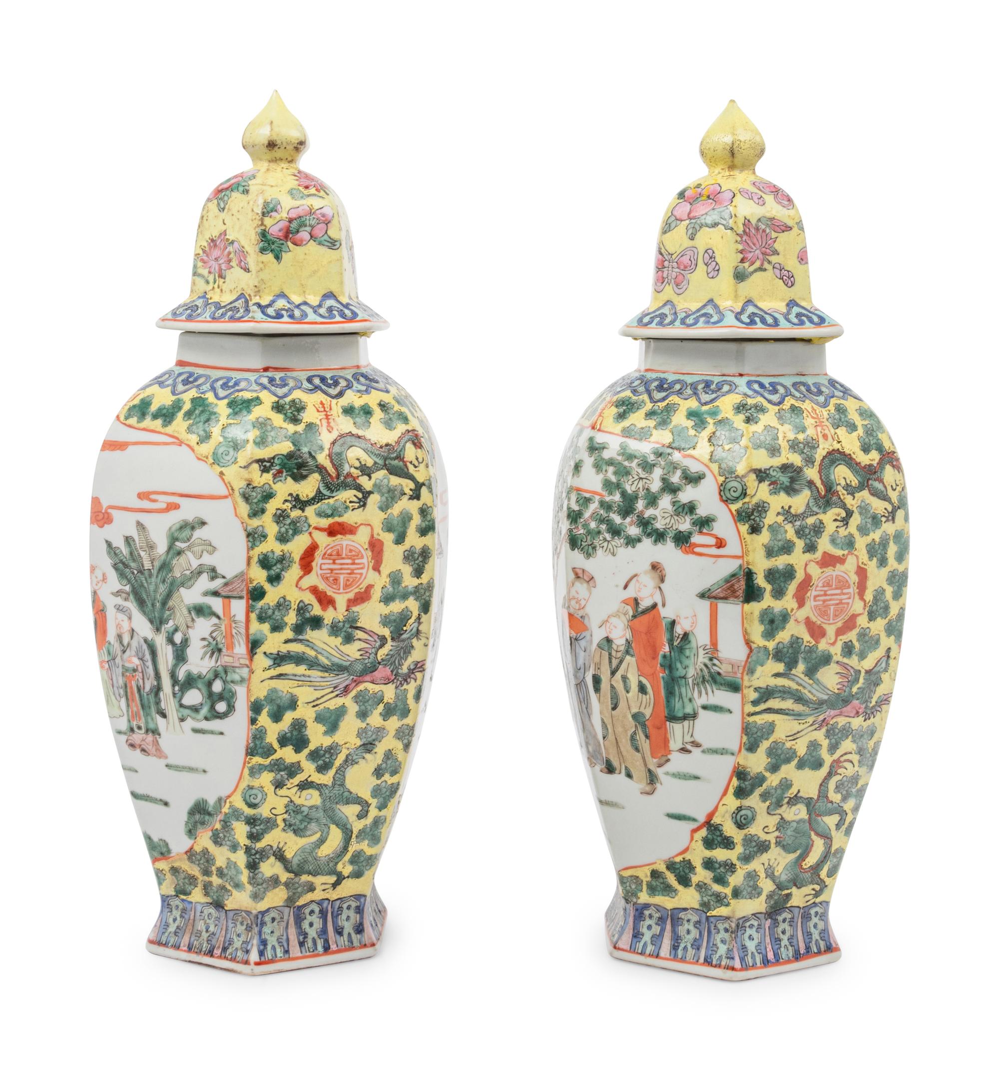 A Pair of Chinese Yellow Ground Famille Rose Hexagonal Vases and Covers