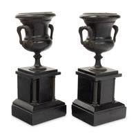 A Pair of Continental Patinated Metal Urns