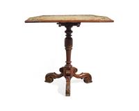 A Victorian Baroque Revival Tilt-Top Table with Needlework Top
