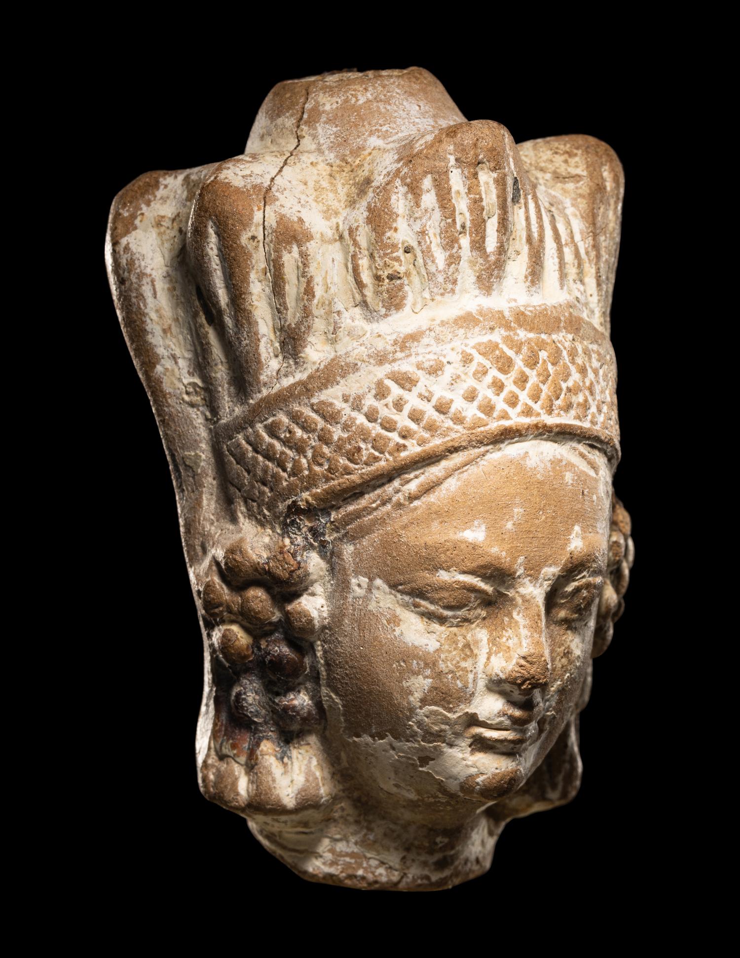 A Ghandaran Terracotta Head of a Woman