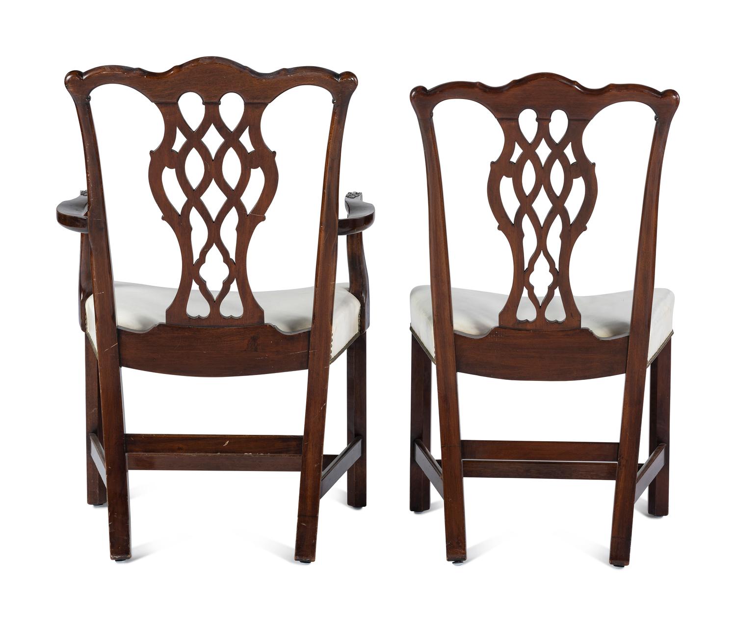A Set of Six Chippendale Style Carved Mahogany Dining Chairs