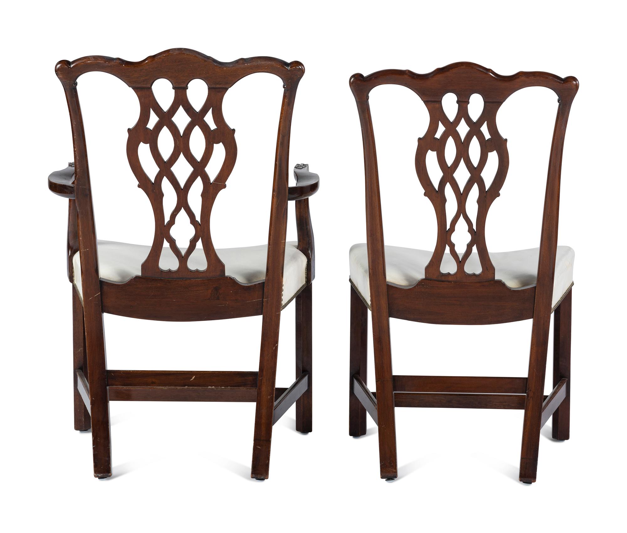 A Set of Six Chippendale Style Carved Mahogany Dining Chairs