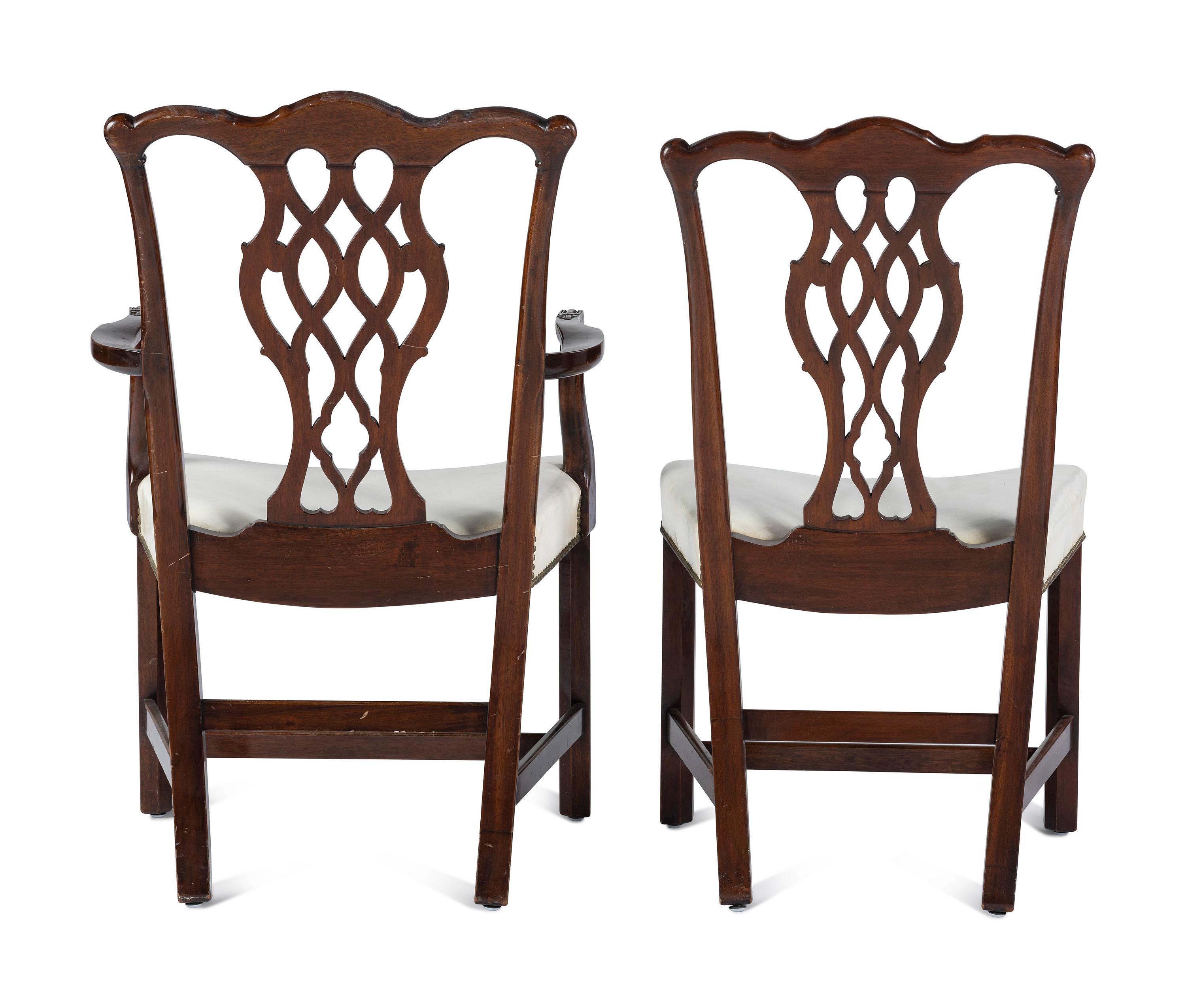 A Set of Six Chippendale Style Carved Mahogany Dining Chairs