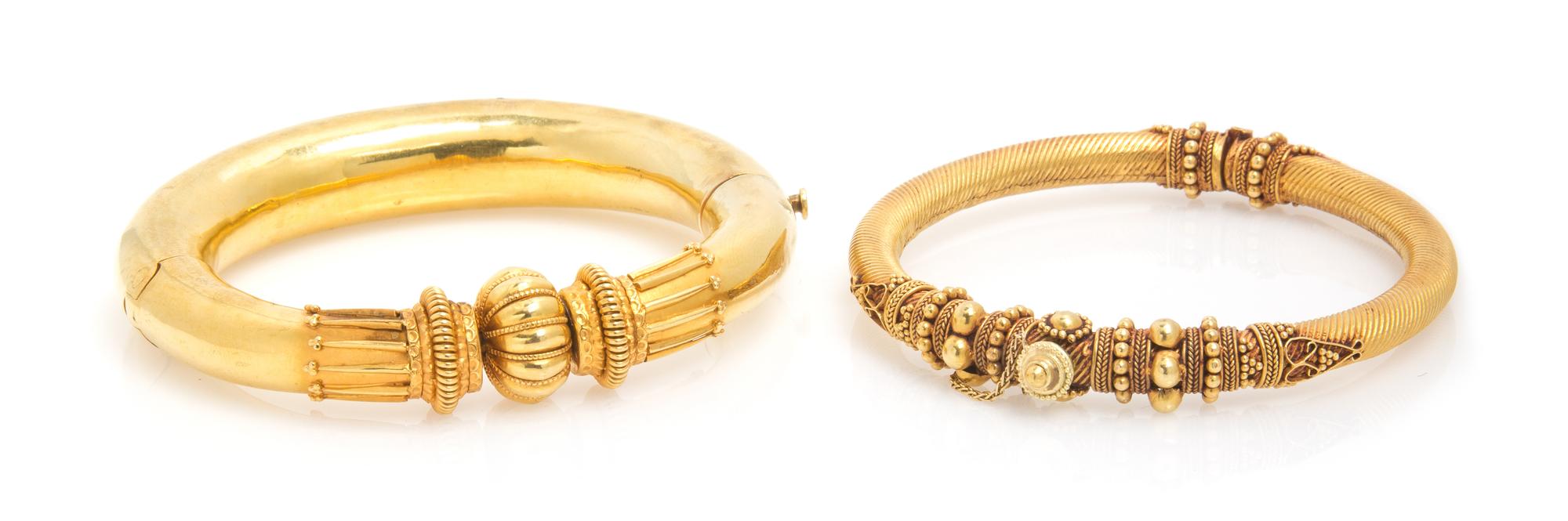 A Collection of High Karat Yellow Gold Hinged Bangle Bracelets, 52.90 dwts.