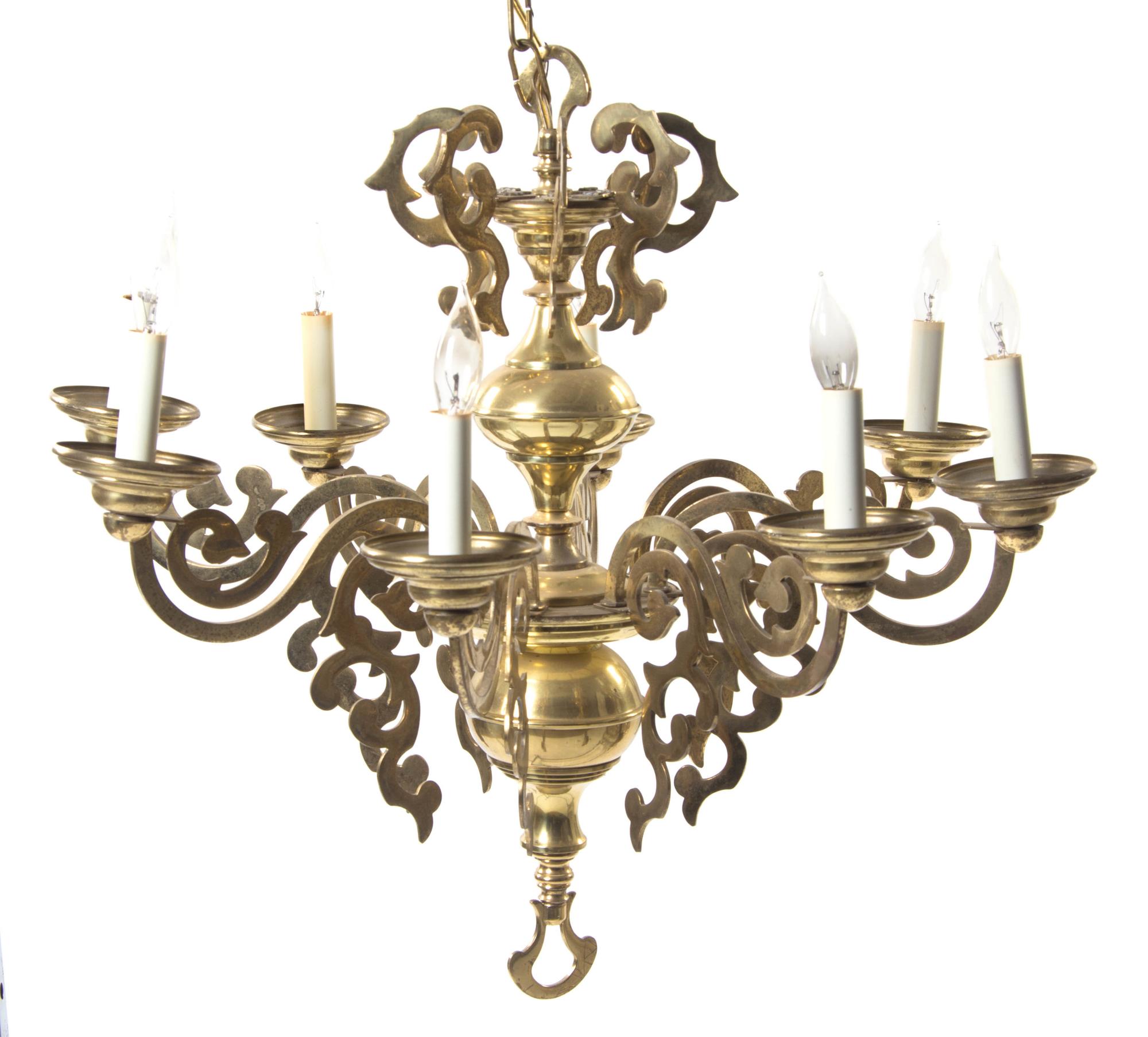A Dutch Baroque Style Brass Eight-Light Chandelier, Height 24 x diameter 26 1/2 inches.