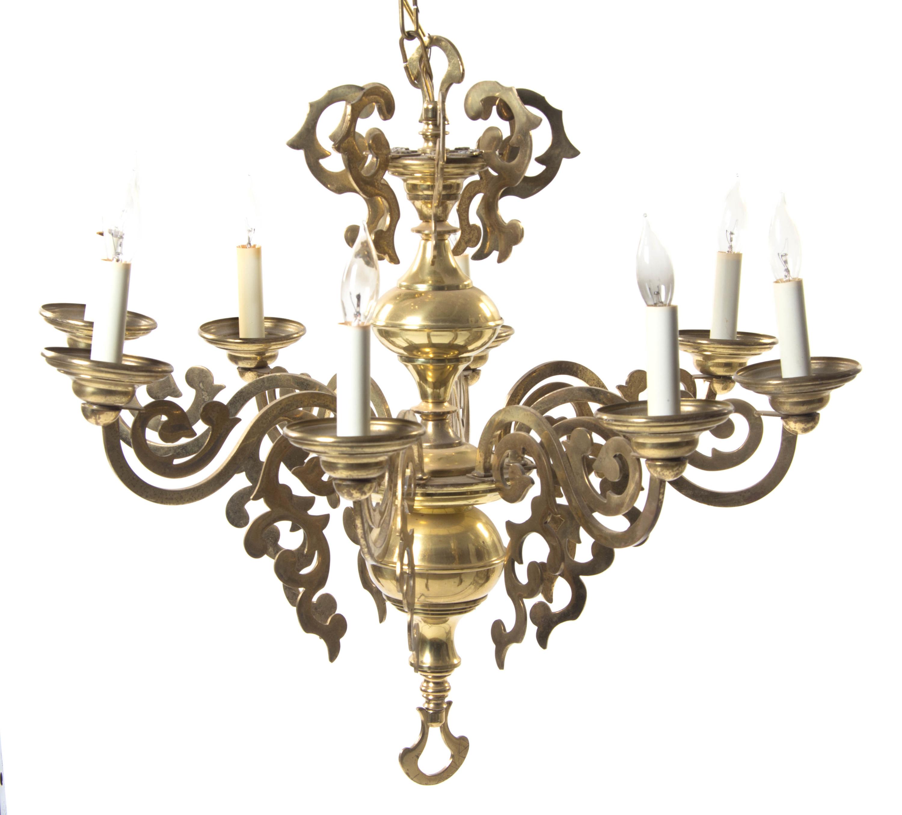 A Dutch Baroque Style Brass Eight-Light Chandelier, Height 24 x diameter 26 1/2 inches.