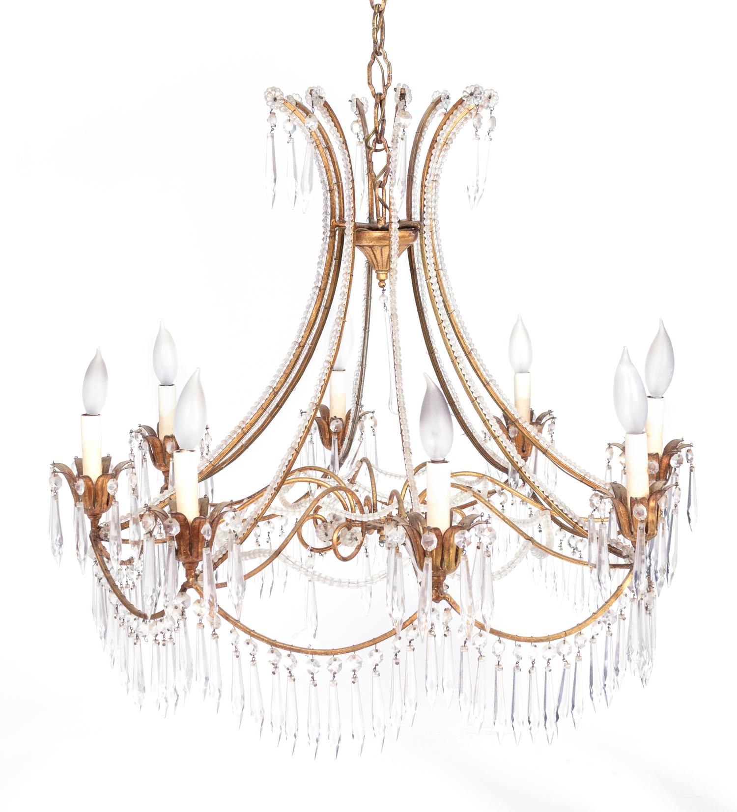 A Regency Style Gilt Metal and Crystal Eight-Light Chandelier — 20TH CENTURY