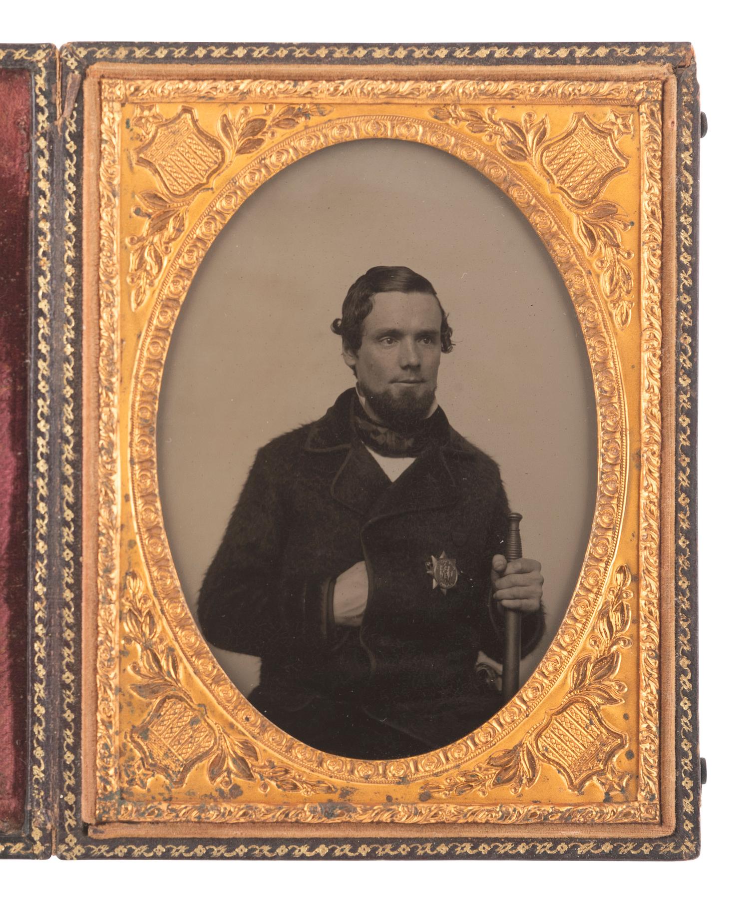 [EARLY PHOTOG.]. Quarter plate ambrotype of a Jersey City policeman with baton, wearing a badge.