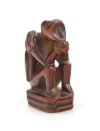 A Japanese Carved Boxwood Netsuke Length 2 1/8 inches. — 19TH/20TH CENTURY