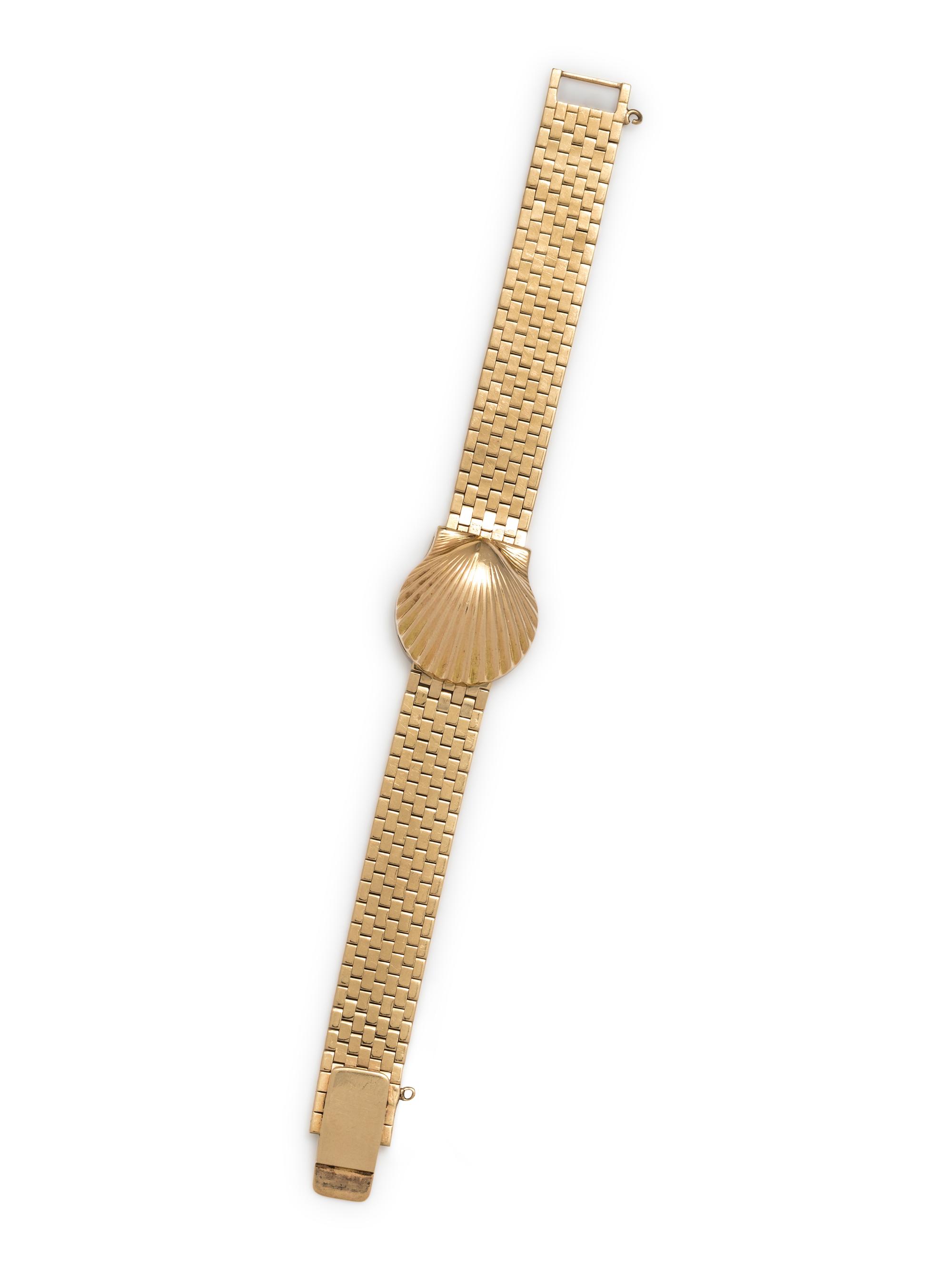 J. SCHULZ, 14K YELLOW GOLD SEASHELL SURPRISE WATCH