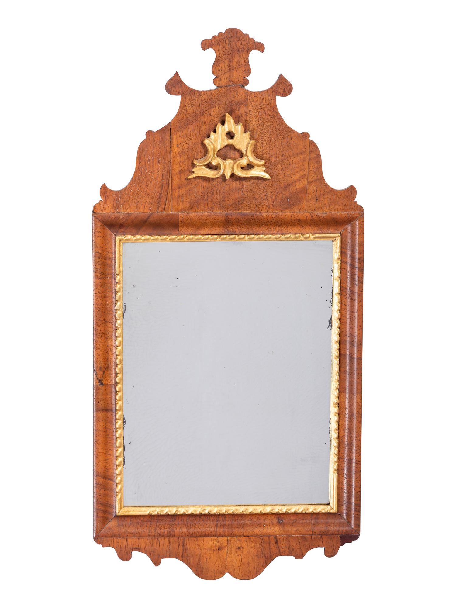 A Queen Anne Parcel Gilt Walnut Looking Glass
