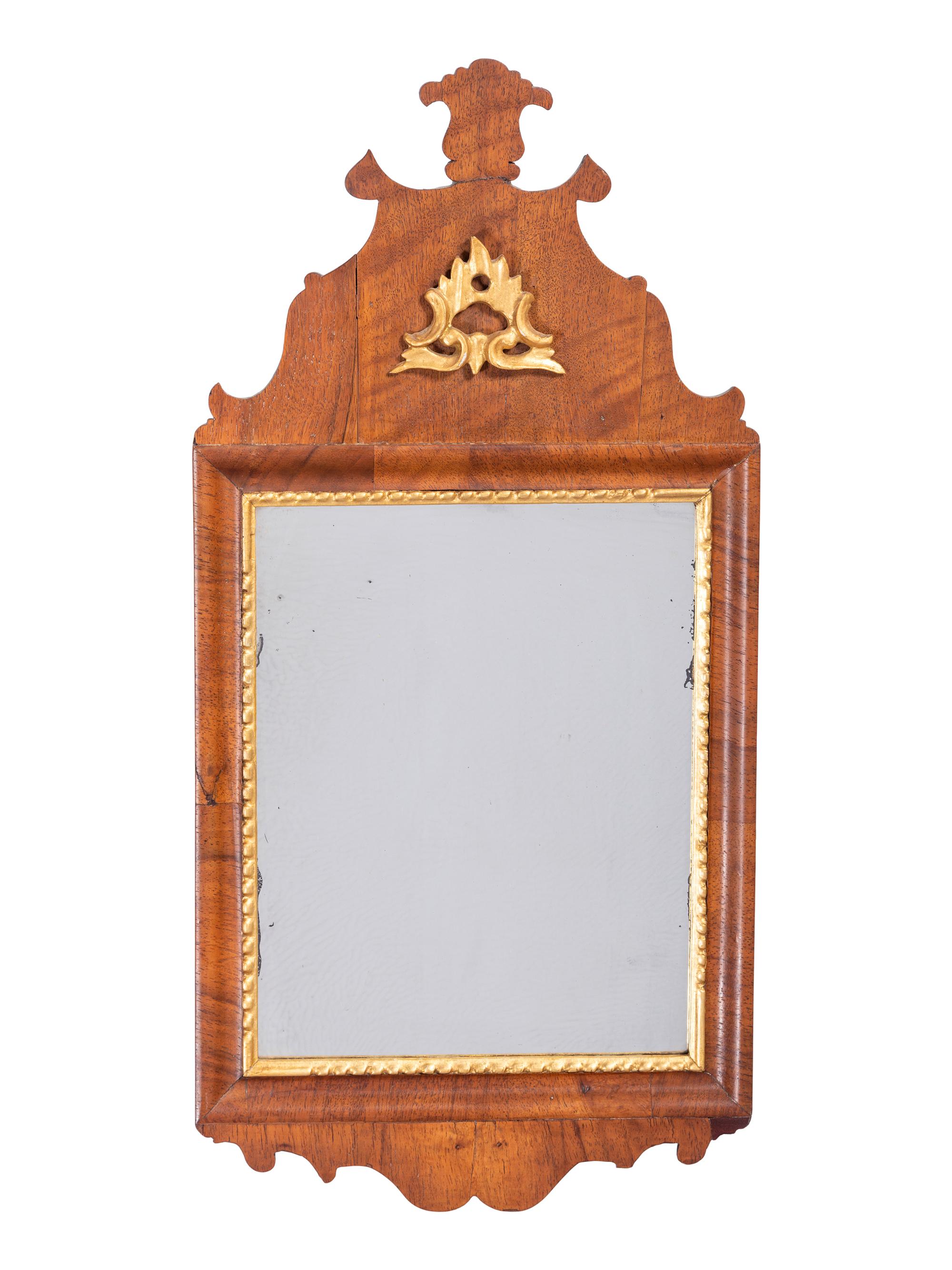 A Queen Anne Parcel Gilt Walnut Looking Glass