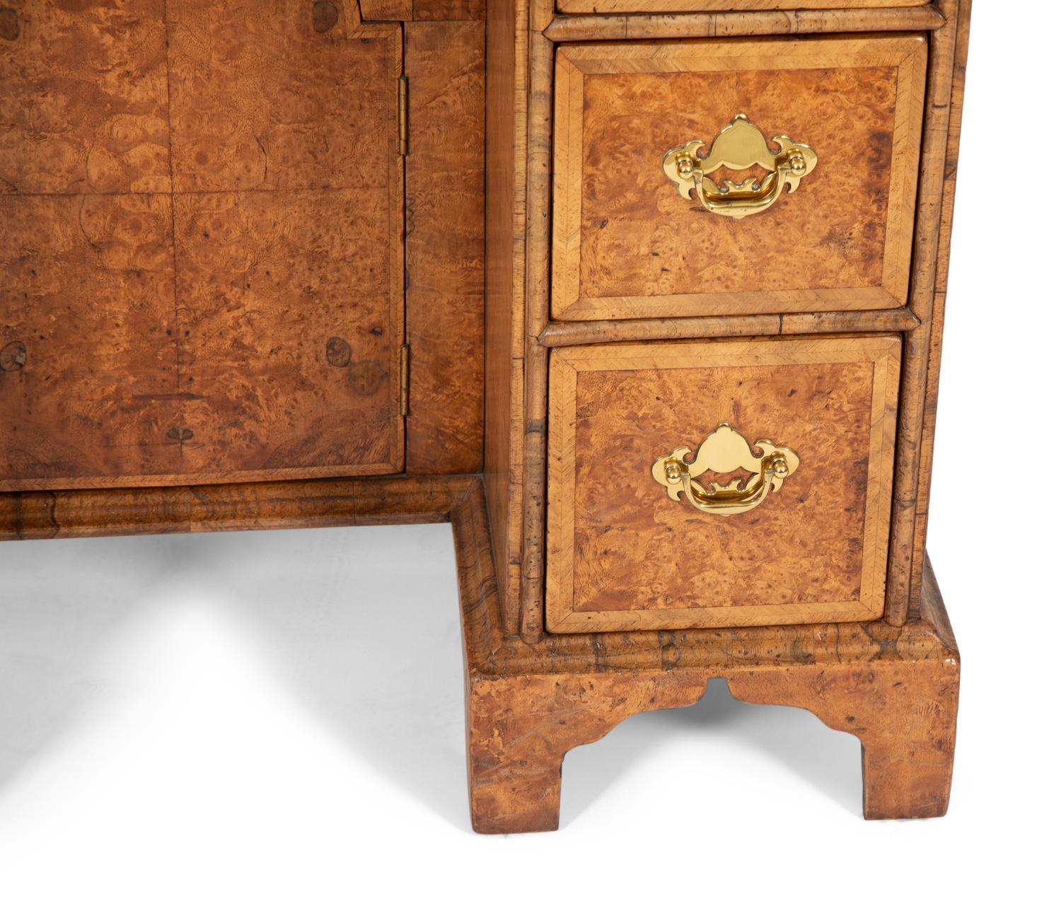 A George II Style Yew and Walnut Kneehole Desk