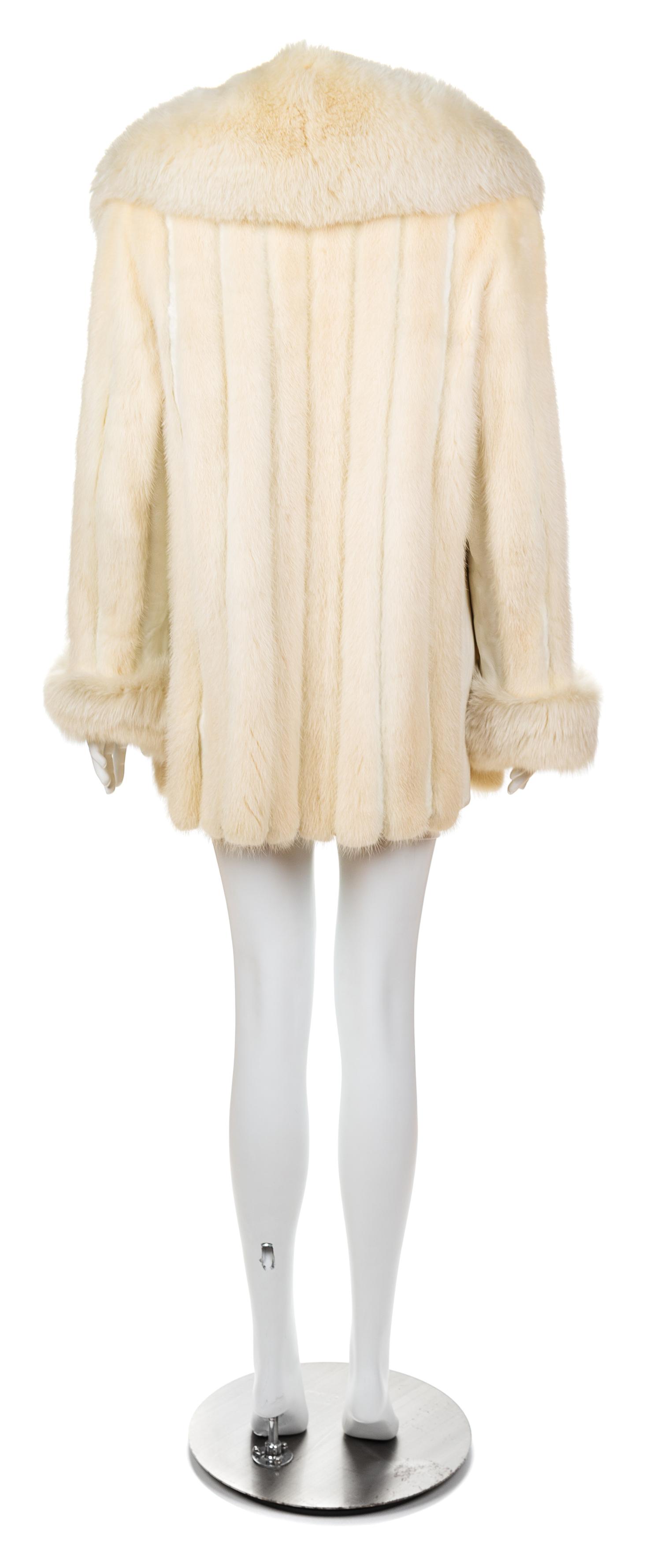 A White Mink, Fox, and Leather Coat, No size.
