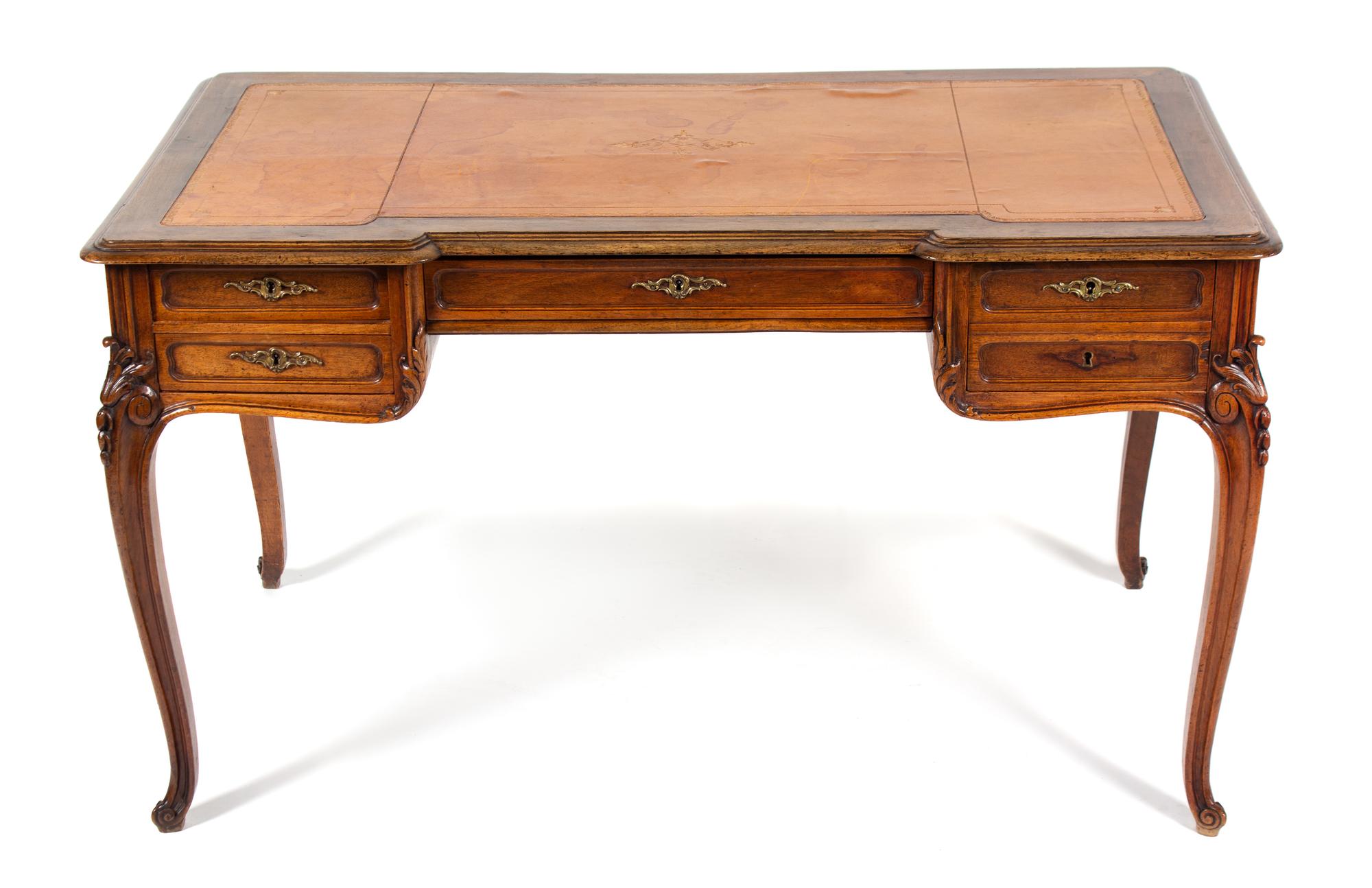 A Louis XV Style Walnut Bureau Plat