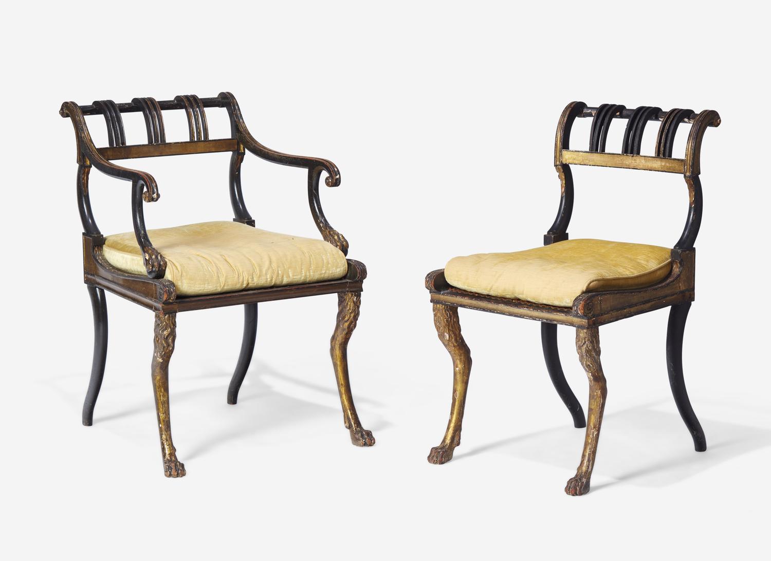 A Set of Three Regency Parcel-Gilt and Ebonized Caned Seat Dining Chairs