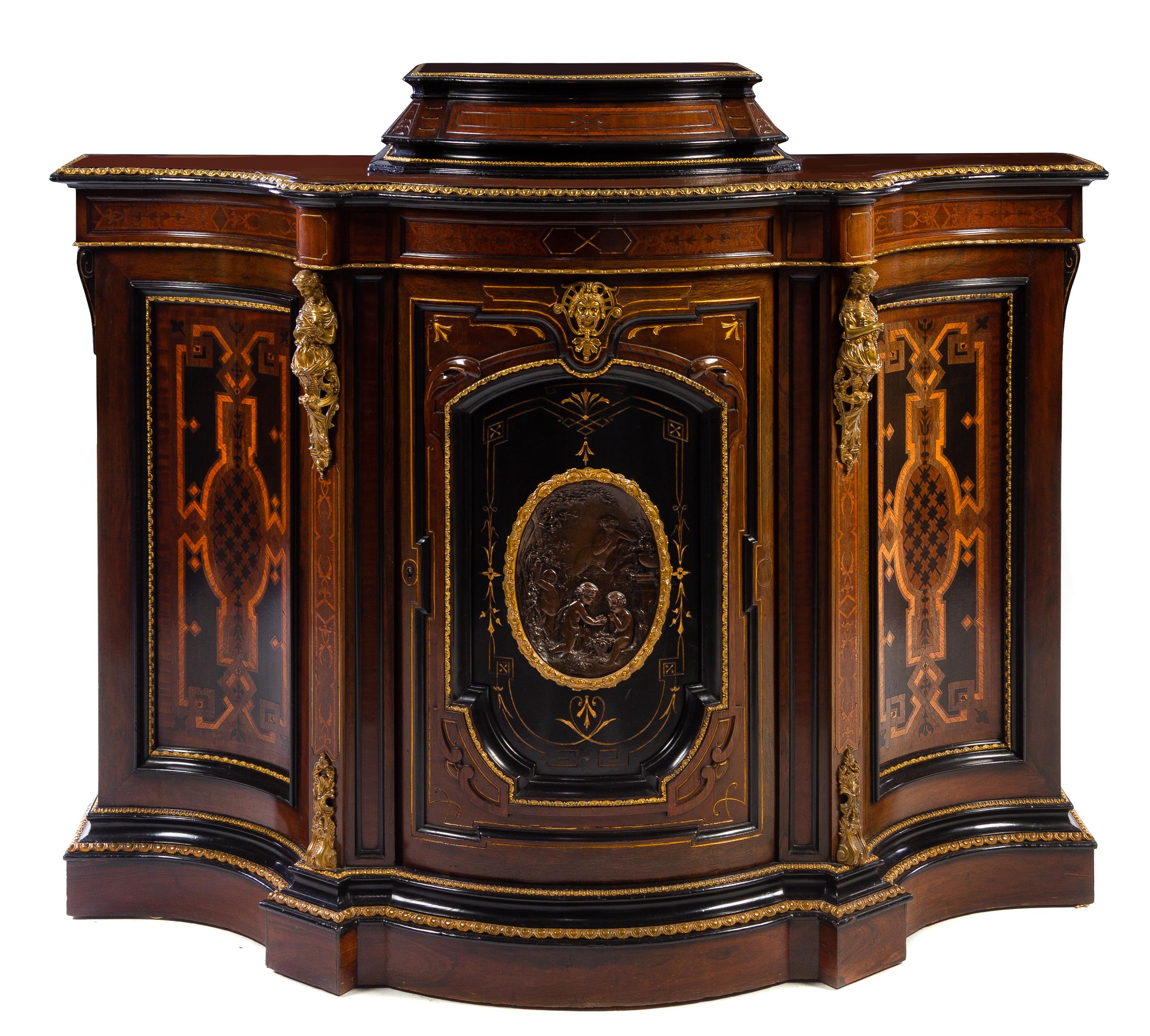 A Victorian Parcel Gilt and Gilt Bronze Mounted Rosewood Cabinet Height 42 x width 60 x depth 20 1/2 inches. — MANNER OF POTTIER & STYMUS, LATE 19TH CENTURY