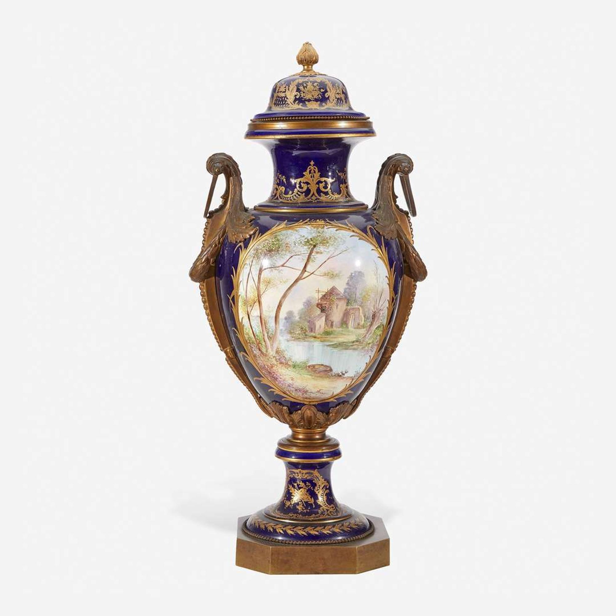 A Large Gilt Bronze Mounted Sèvres Style Cobalt Ground Porcelain Urn late 19th century