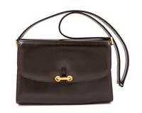 A Gucci Dark Brown Leather Flap Handbag, 8" x 6" x 2"; Strap drop: 14".