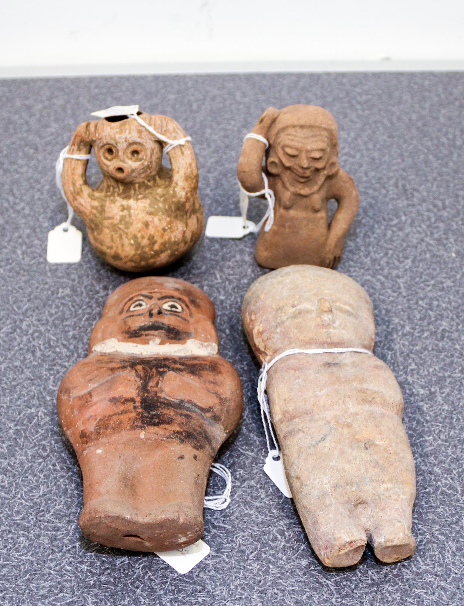 A Group of Etruscan Terracotta Figures Height of tallest 6 inches.