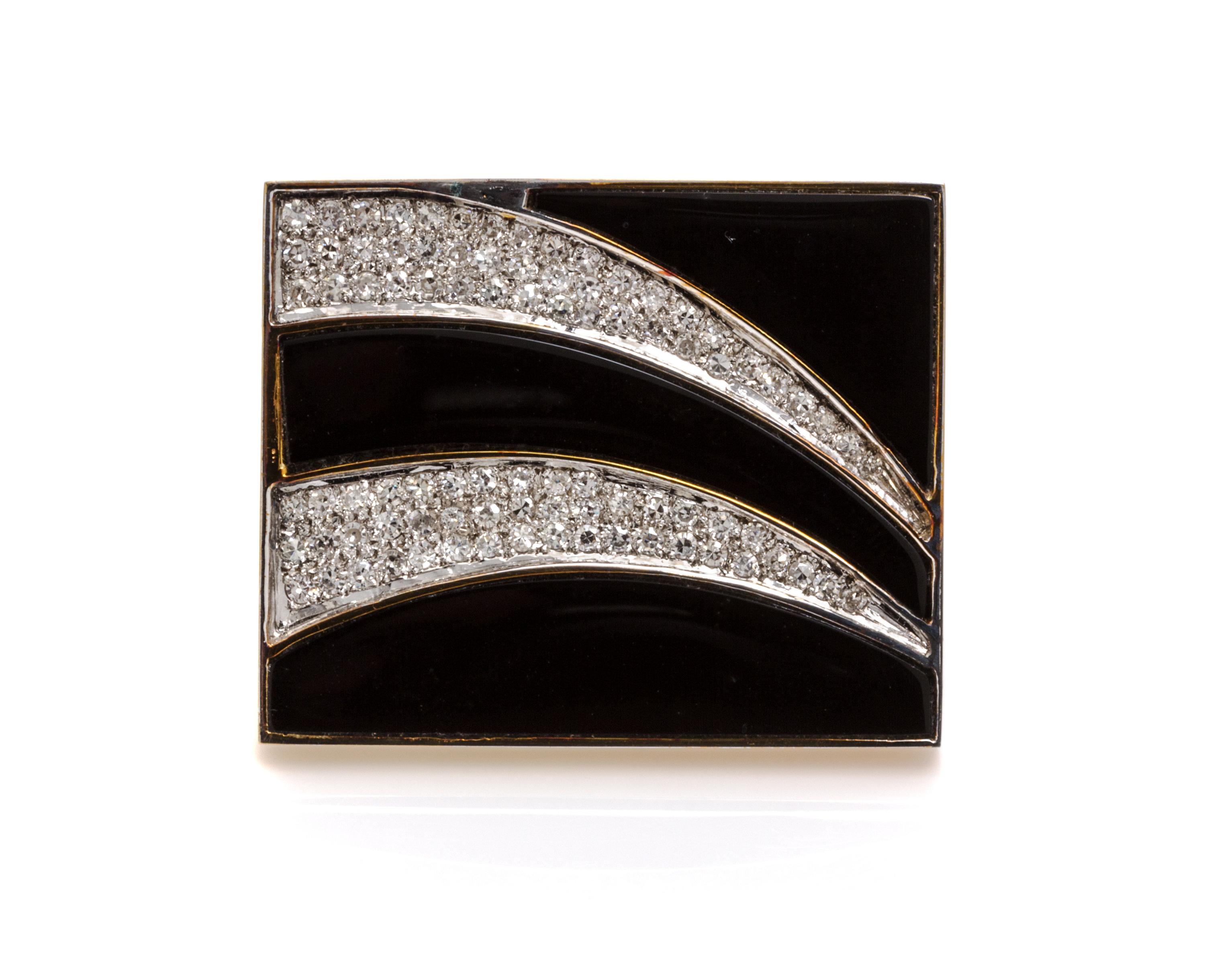A 14 Karat Yellow Gold, Onyx and Diamond Brooch, 14.30 dwts.
