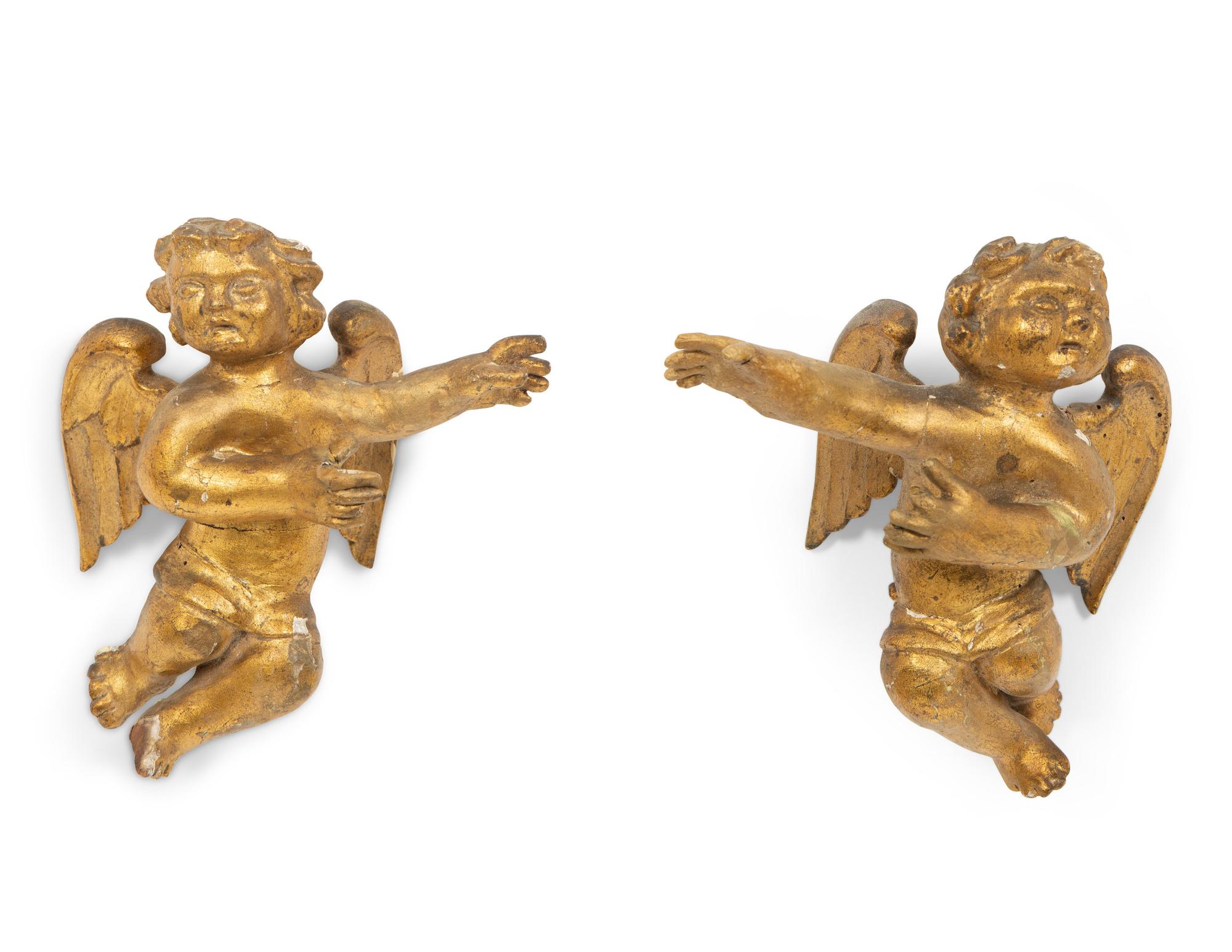 A Pair of Italian Gilt Wood Angel Wall Mounts