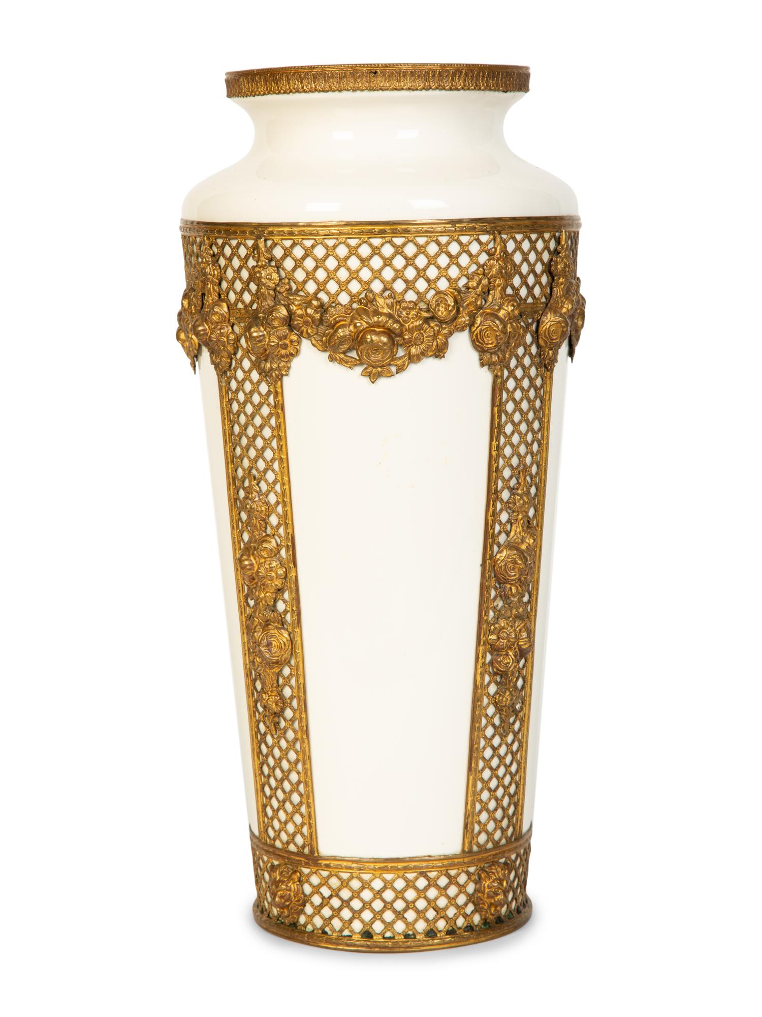 A Continental Gilt Metal Mounted Porcelain Vase