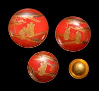 A Set of Three Japanese Gilt Decorated Red Lacquered Stem Dishes