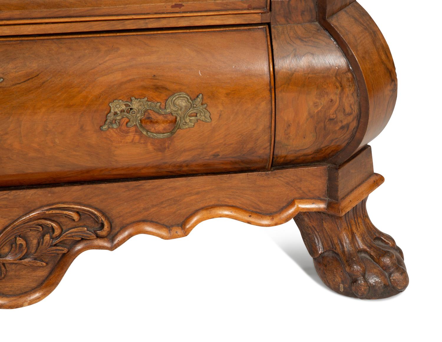 A Dutch Walnut Bombé Chest of Drawers