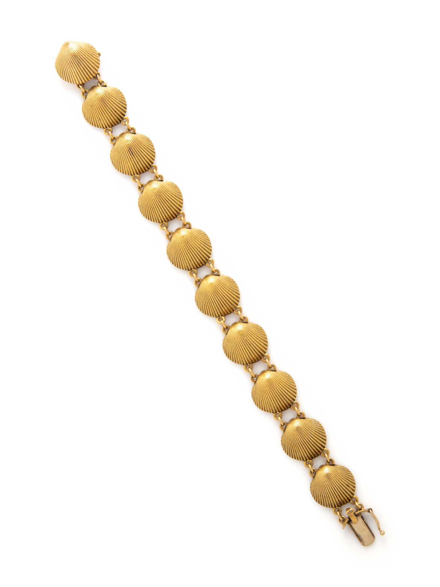 YELLOW GOLD SHELL MOTIF BRACELET