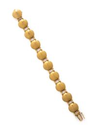 YELLOW GOLD SHELL MOTIF BRACELET