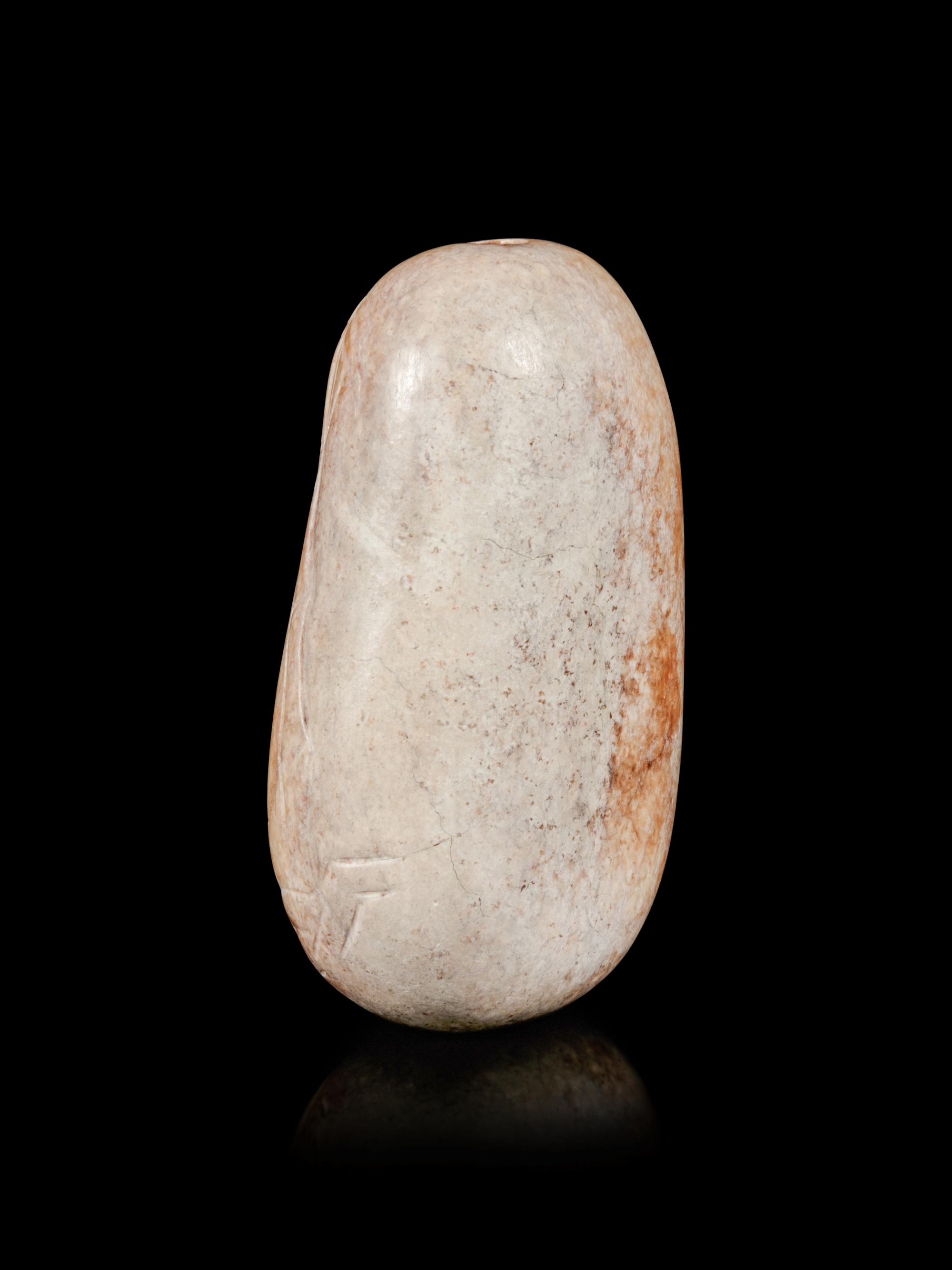 A Burned Jade Pebble-Form Snuff Bottle