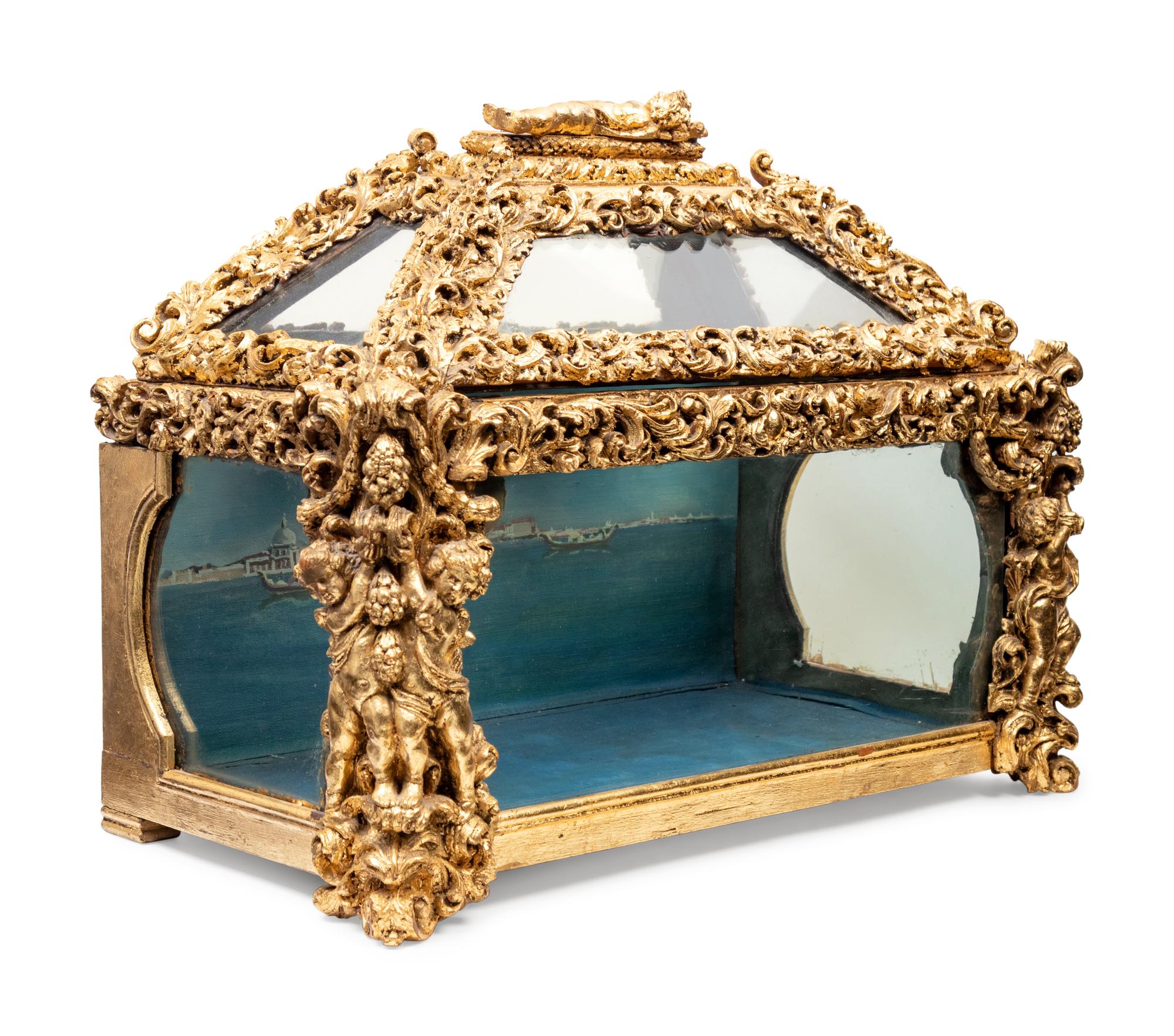 A Baroque Style Carved Giltwood Table Vitrine
