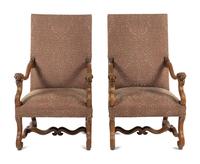 A Pair of French Carved Walnut Fauteuils