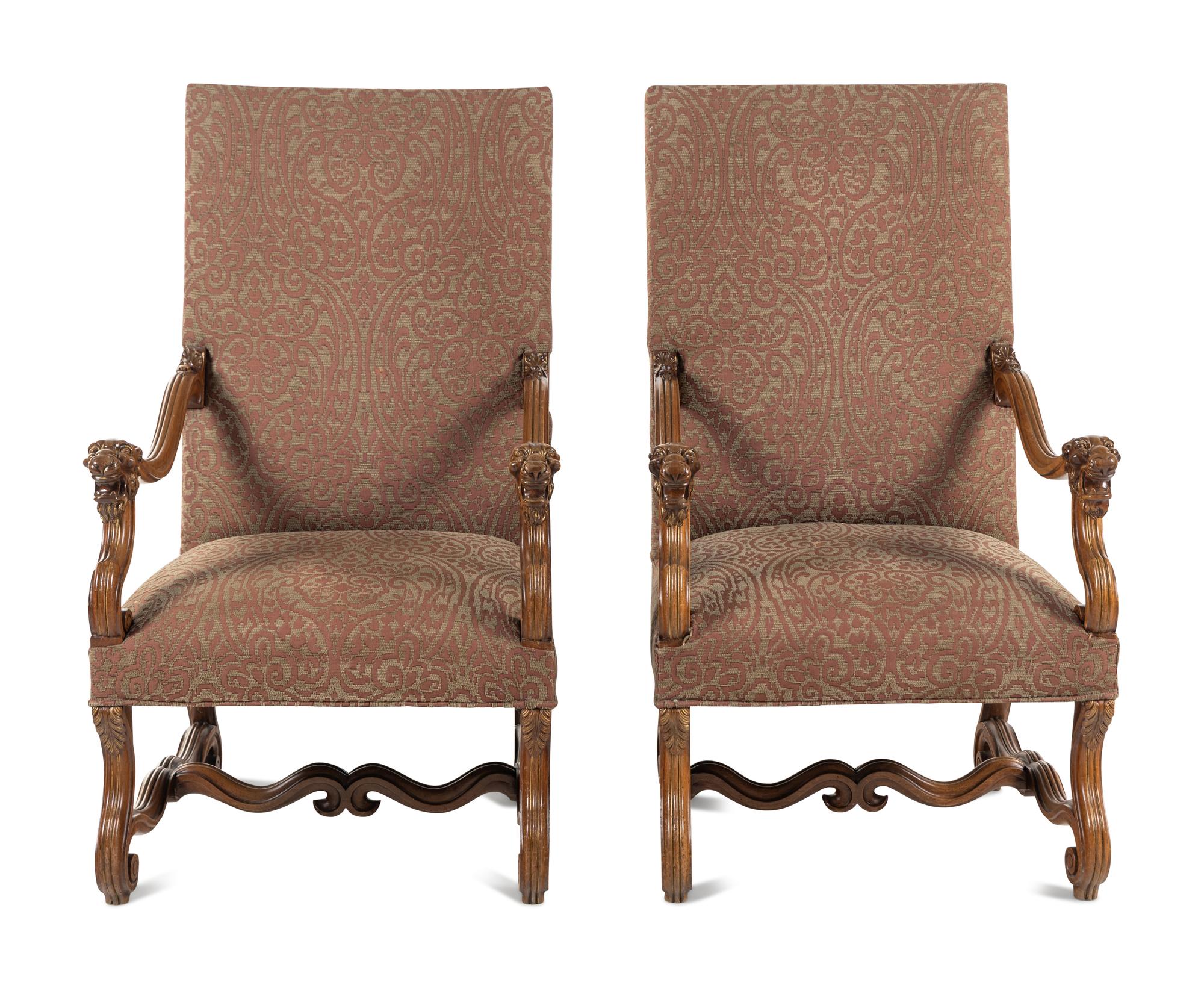 A Pair of French Carved Walnut Fauteuils