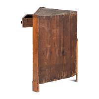 A Chippendale Incised Walnut Corner Cupboard