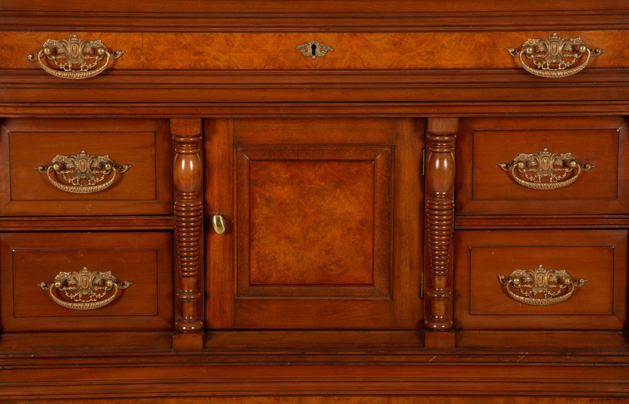 A Victorian Burl Inlaid Mahogany Chest of Drawers
