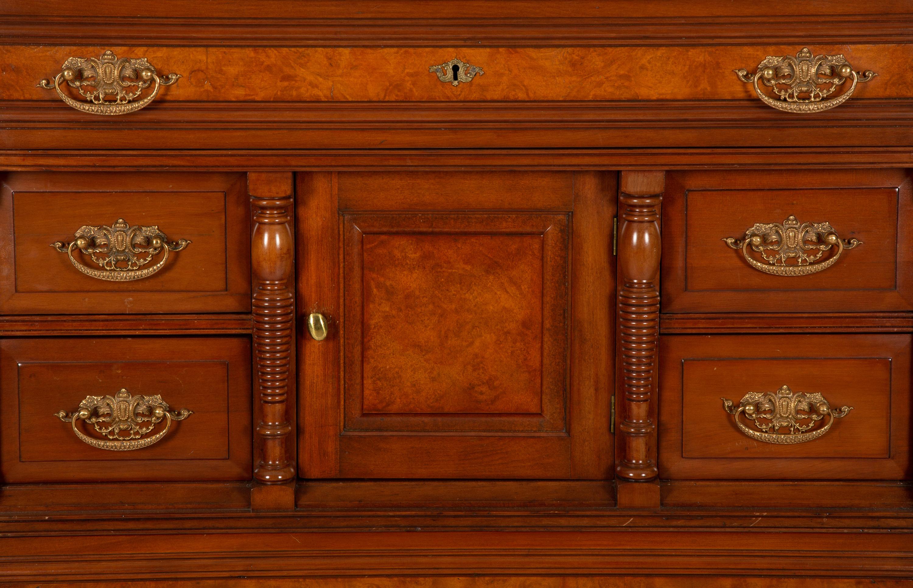 A Victorian Burl Inlaid Mahogany Chest of Drawers