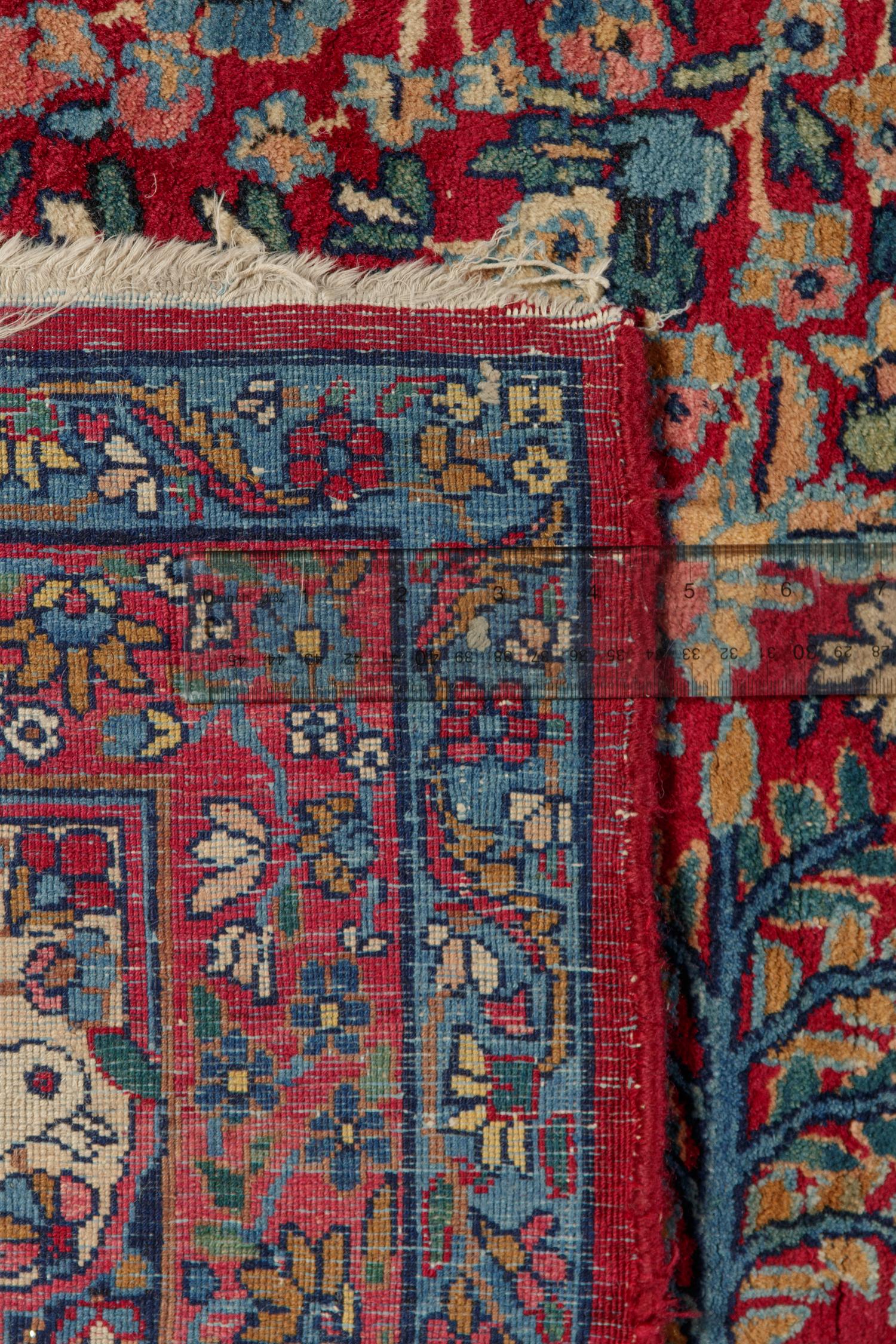 A Kirman Pictorial Wool Rug