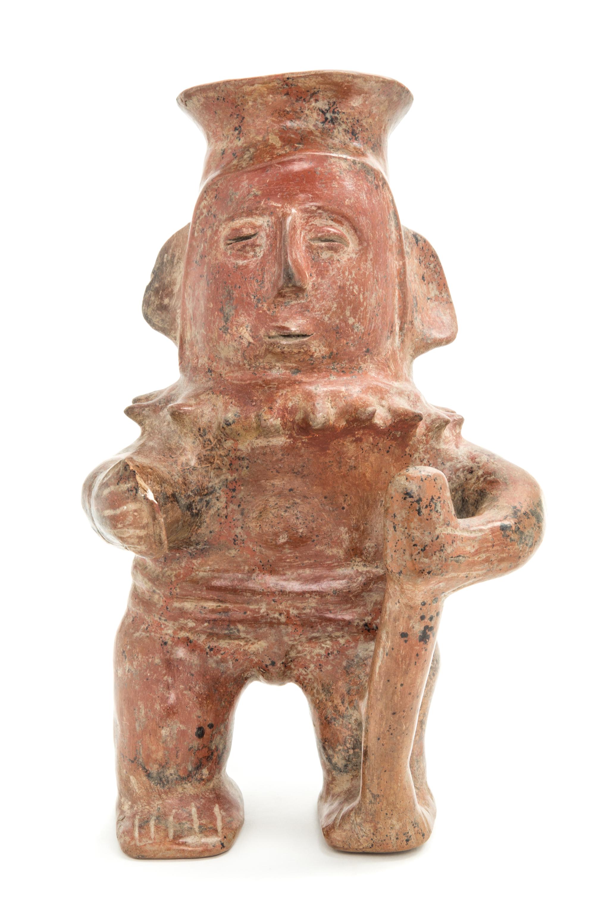 A Mexican Colima Polished Earthenware Figure of a Female. Height 10 1/2 x width 6 x depth 6 inches.