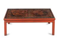 A Chinese Carved and Polychrome Painted Red Lacquered Low Table