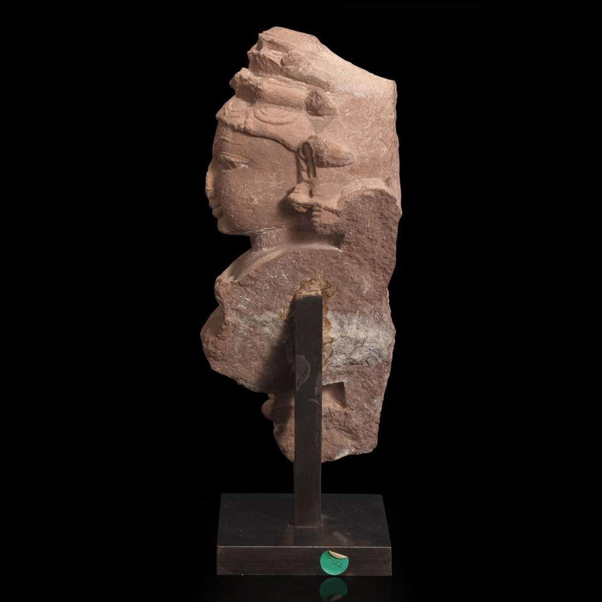 An Indian carved pinkish-buff sandstone bust of a female deity 砂岩雕女神像 Uttar Pradesh, 10th / 11th century ??? ??????