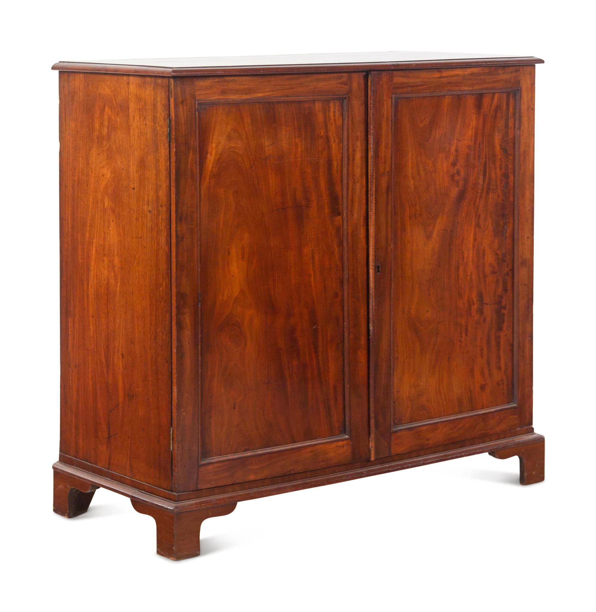 An English Mahogany Collector’s Cabinet