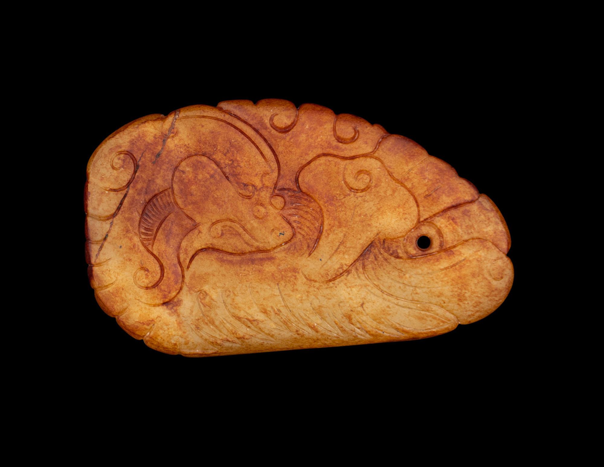 A Chinese Russet and White Jade 'Dragon' Pendant